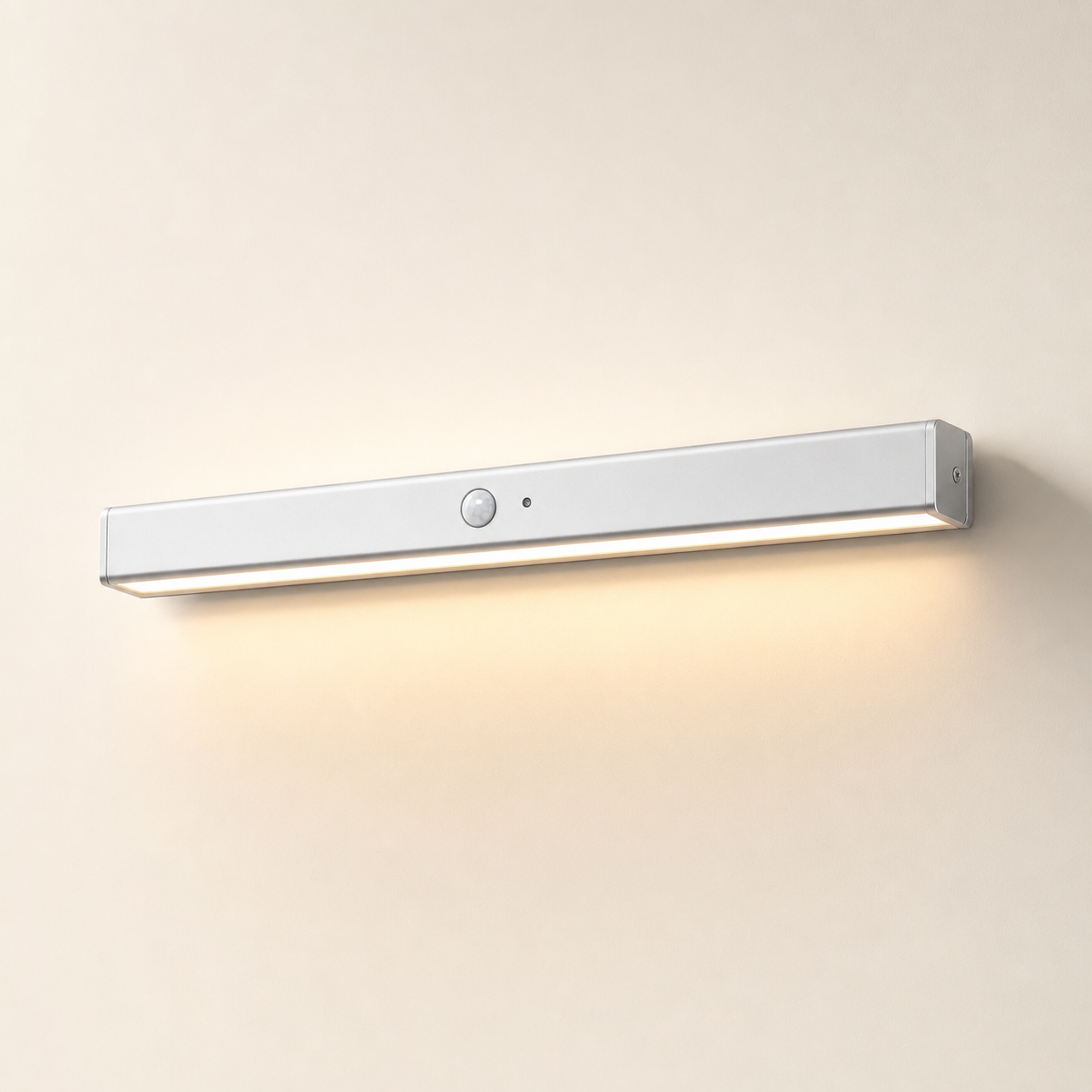 Motion-sensor light bar installed under a cabinet